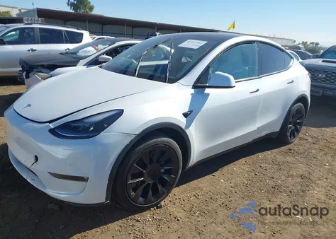 2022 Tesla Model Y из США, поврежденный, VIN 7SAYGDEE1NF554234